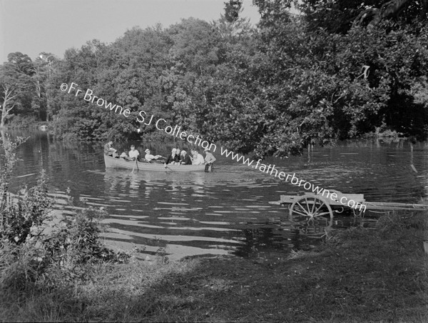 NOVICES BOATING ON LAKE